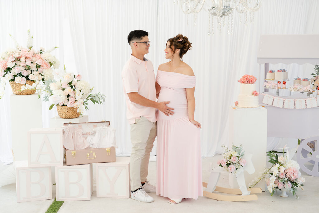 Garden Rose baby shower with blush pink florals, elegant dessert table, custom décor, and timeless outdoor celebration at Serena Village in Miami
