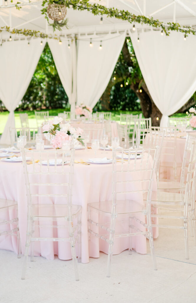 Elegant baby shower tablescape with handmade linens and soft floral arrangements.